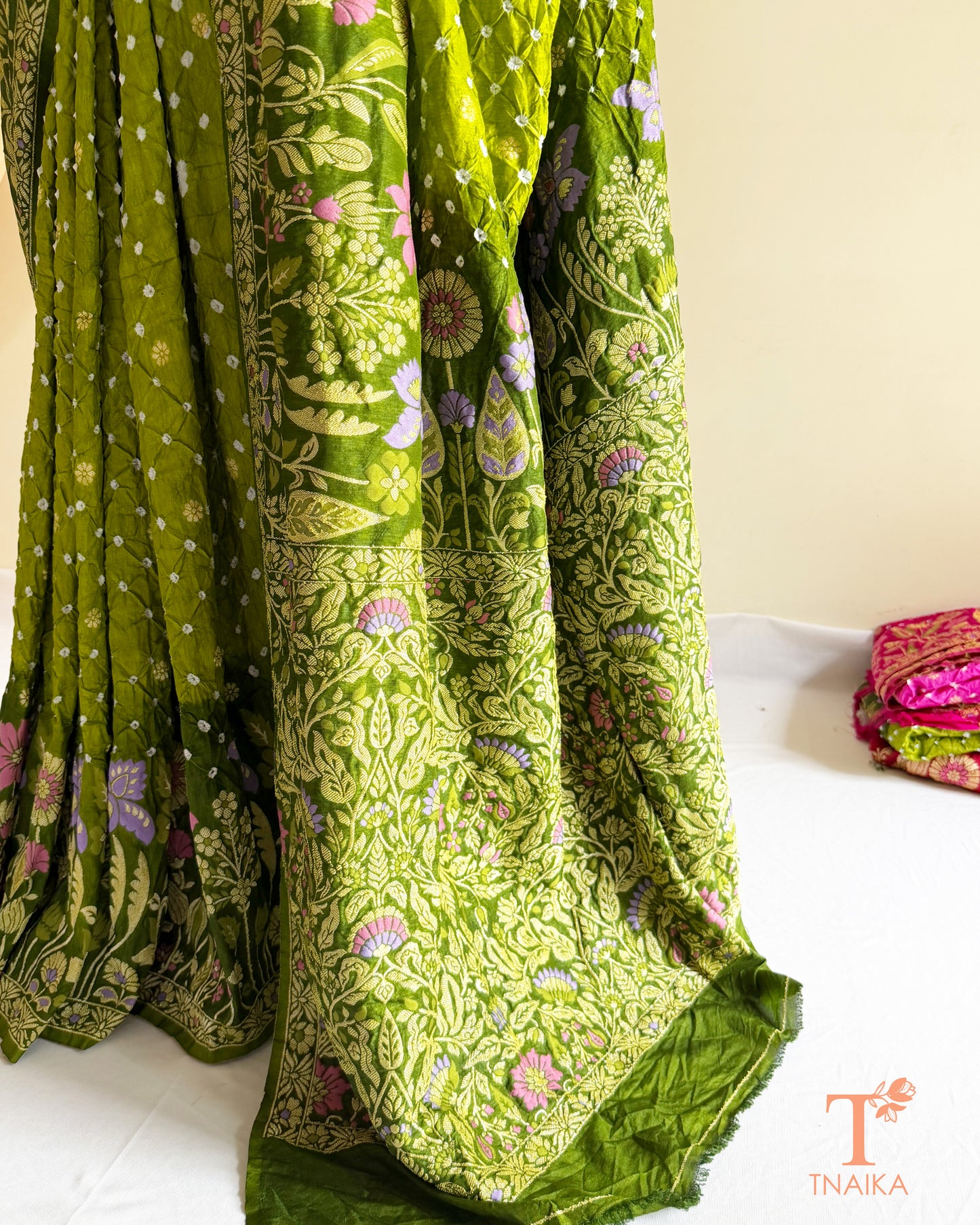 Festive Bandhej Dupion Silk saree featuring a rich woven border and pallu.