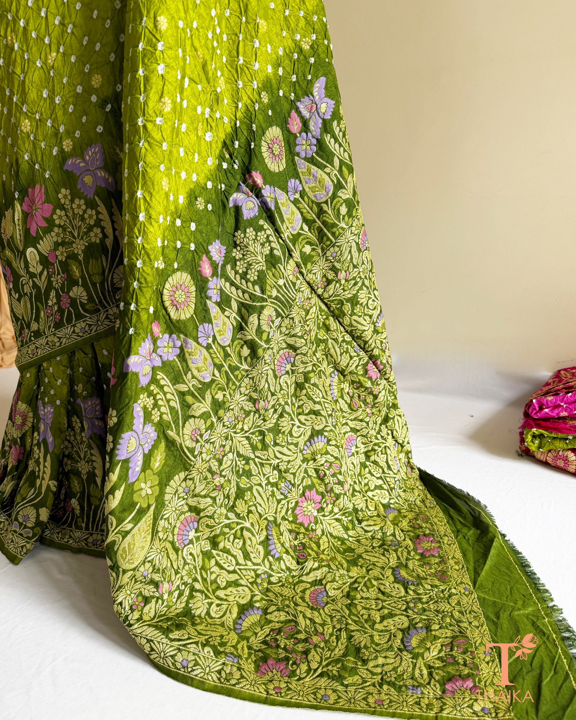 Premium Bandhej Dupion Silk saree featuring intricate Meenakari woven motifs.