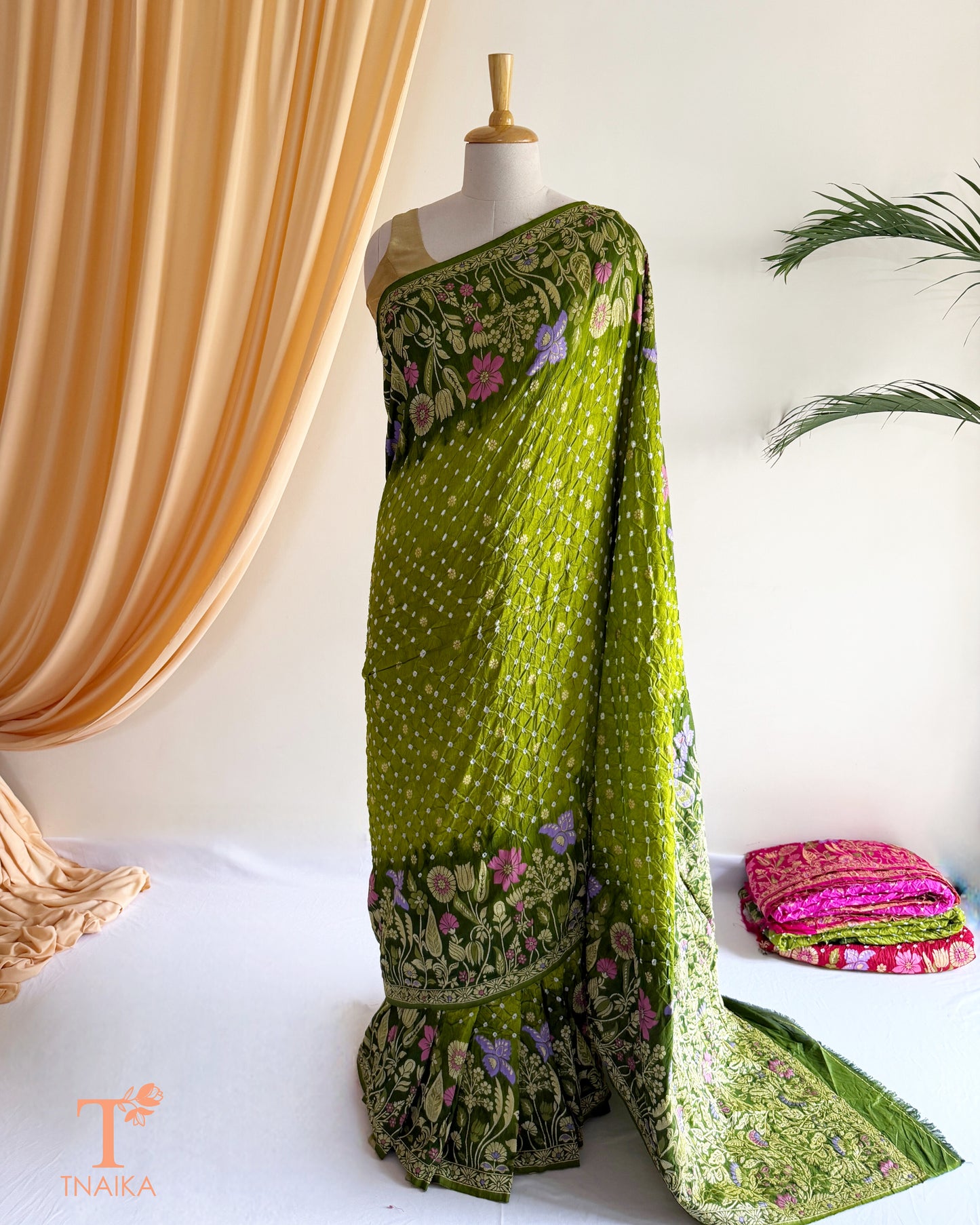 Meenakari Kanjivaram inspired Bandhej Dupion Silk saree with rich woven floral border.