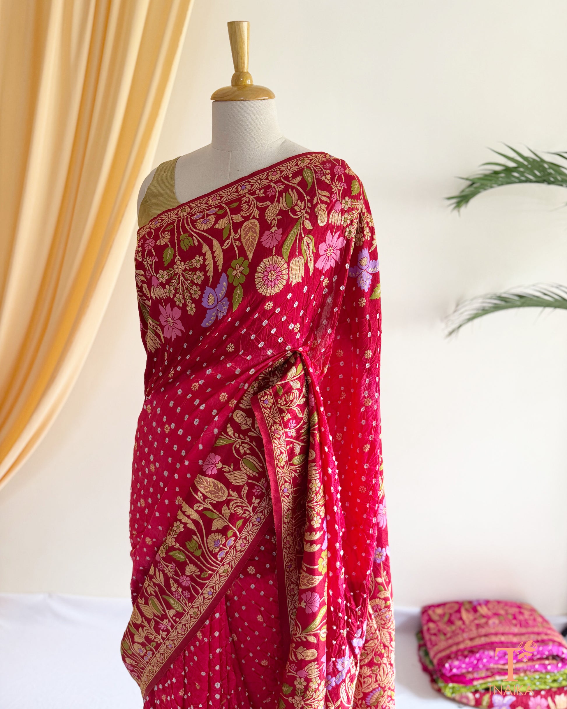 Heritage-inspired Bandhej Dupion Silk saree with luxurious woven detailing.