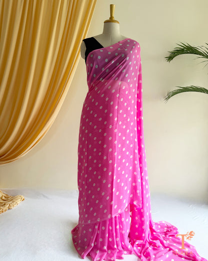 Lightweight georgette saree featuring elegant polka dot prints.