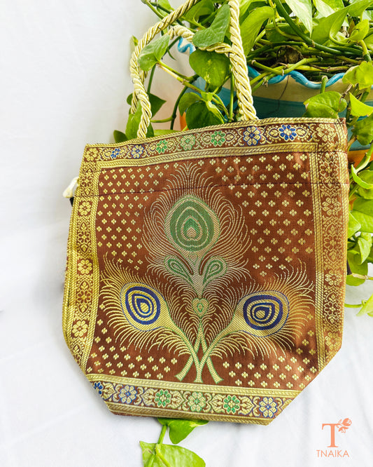 Handcrafted Banarasi brocade 2-in-1 ethnic bag with woven motifs, designed for use as both a spacious tote and an elegant potli.