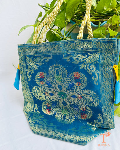 Handcrafted Banarasi brocade 2-in-1 ethnic bag with woven motifs, designed for use as both a spacious tote and an elegant potli.