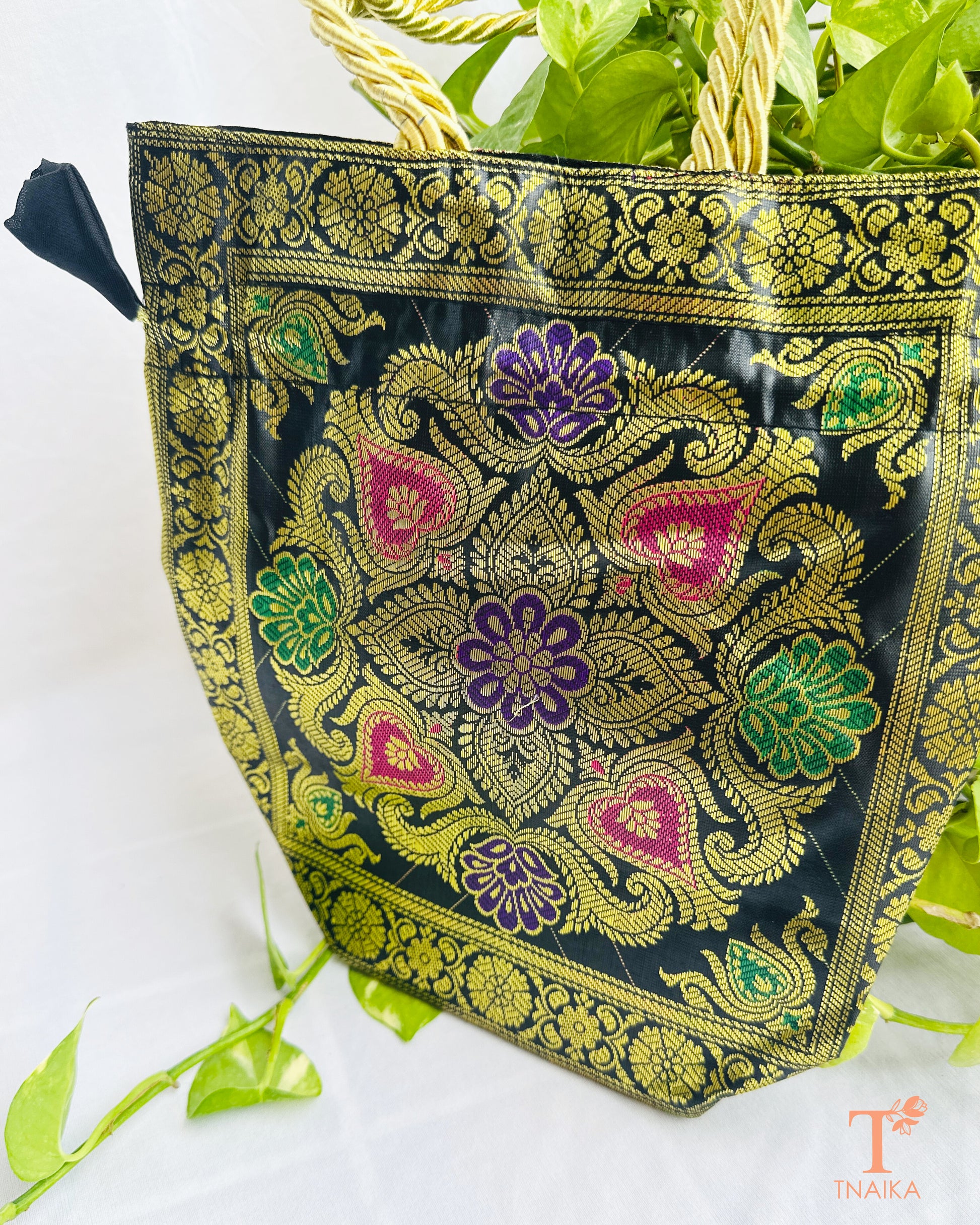 Premium Banarasi brocade 2-in-1 women's ethnic bag with versatile tote and potli design, ideal for weddings, festive wear, and gifting.