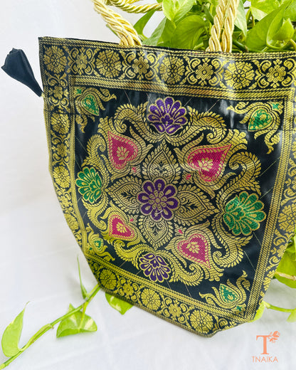 Premium Banarasi brocade 2-in-1 women's ethnic bag with versatile tote and potli design, ideal for weddings, festive wear, and gifting.