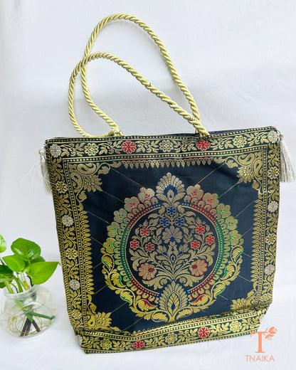 Handcrafted Banarasi bag featuring rich patterns and ethnic detailing