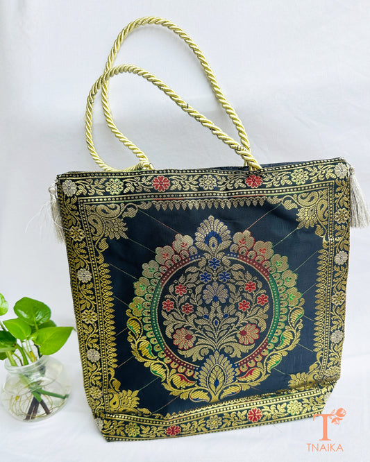 Handcrafted Banarasi bag featuring rich patterns and ethnic detailing