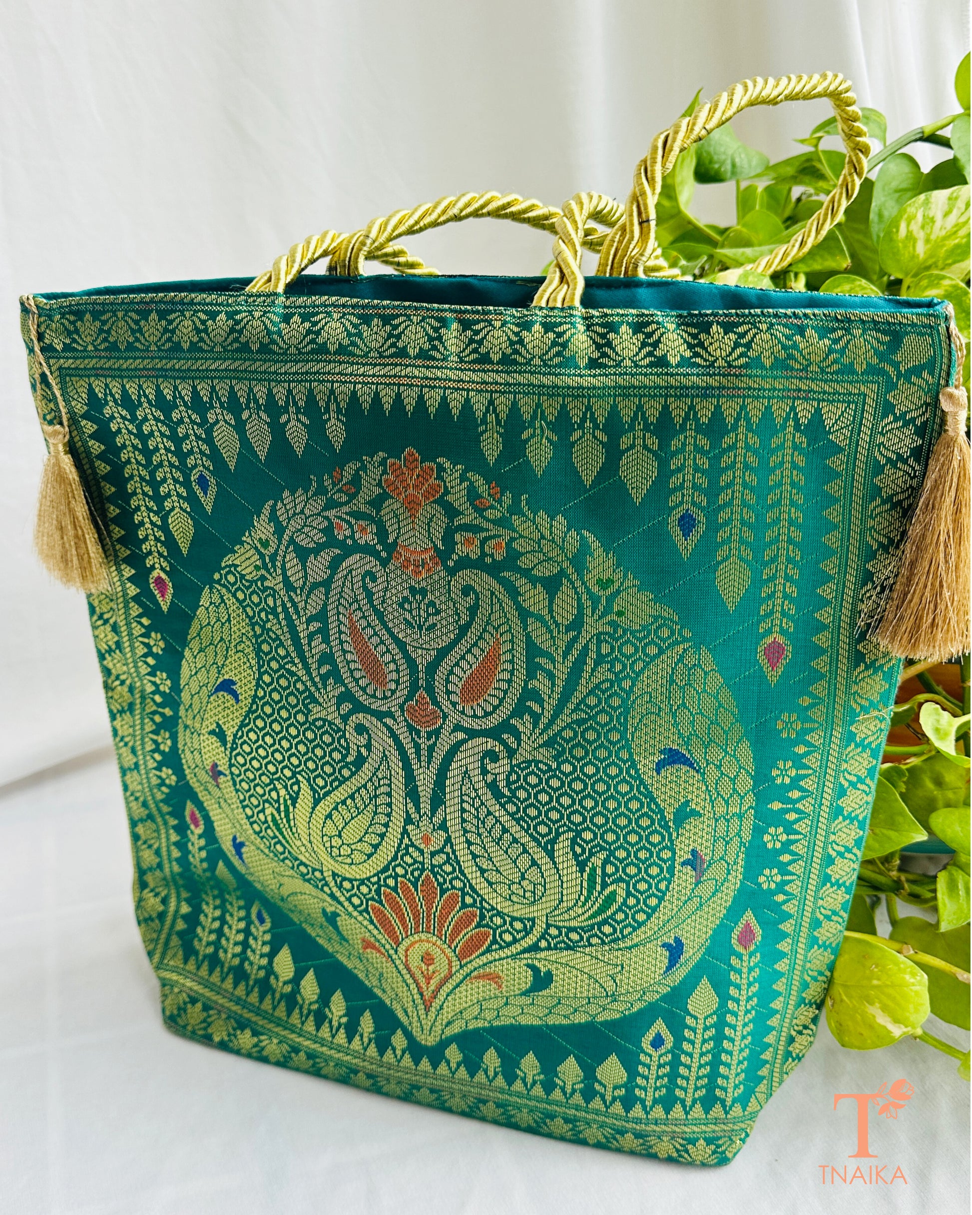 Handcrafted Banarasi bag featuring rich patterns and ethnic detailing