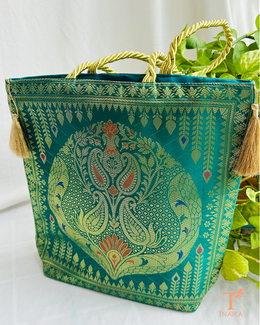 Handcrafted Banarasi bag featuring rich patterns and ethnic detailing