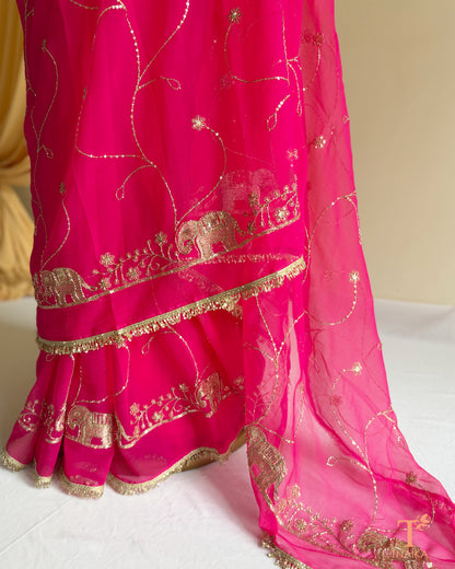 Lightweight georgette saree featuring embroidered elephant border and lace detailing