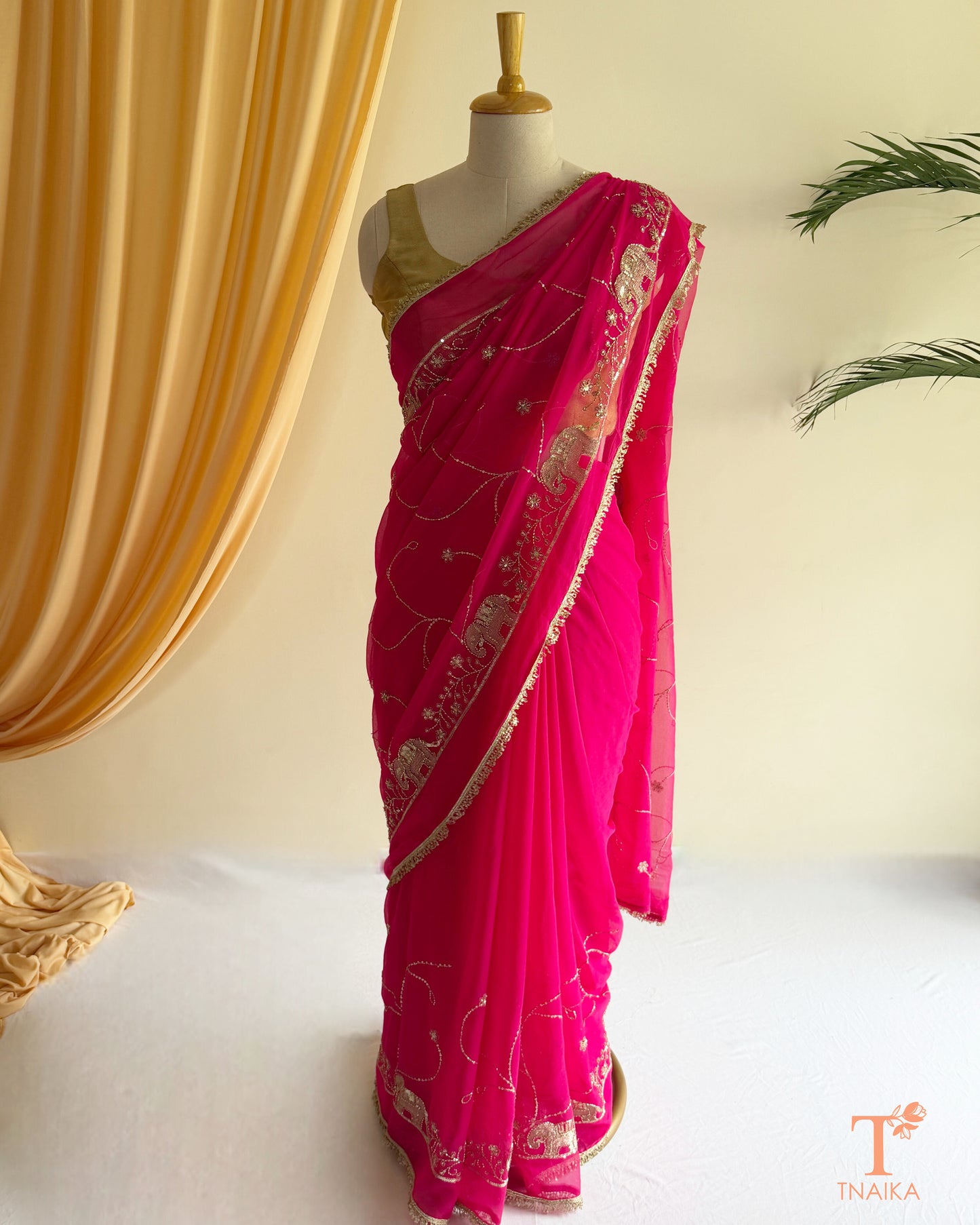 Designer georgette saree with intricate cut dana embroidery and elegant border