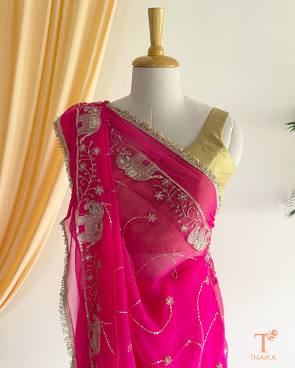 Festive georgette saree with heritage inspired embroidery and flowing drape