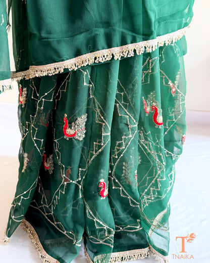 Rajputi style georgette saree with fine cut dana embroidery and elephant motif border