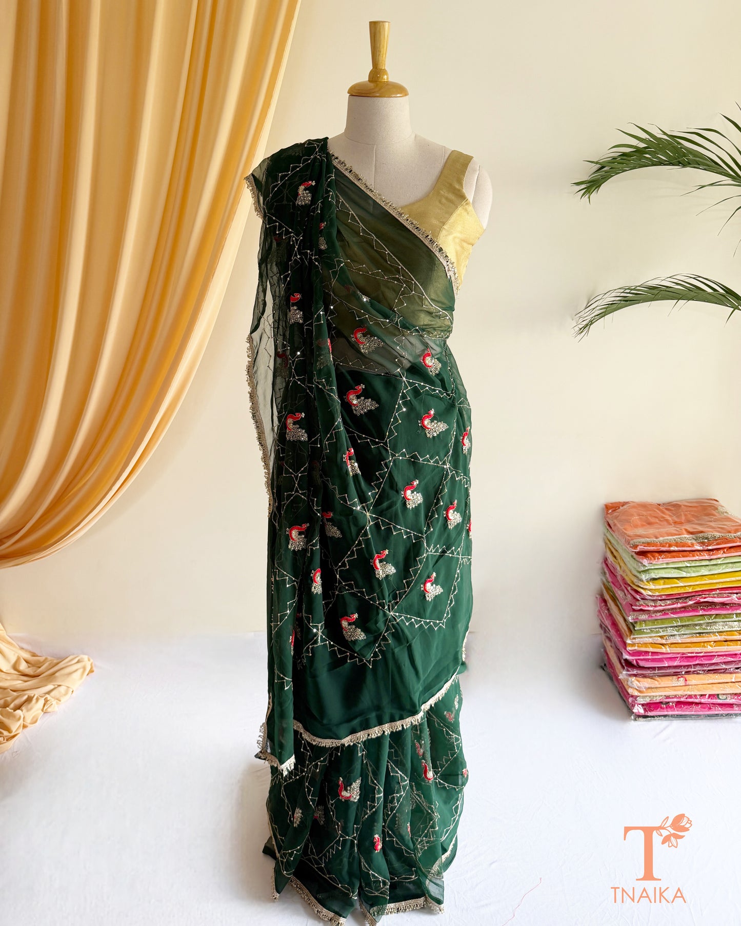 Festive georgette saree with heritage inspired embroidery and flowing drape