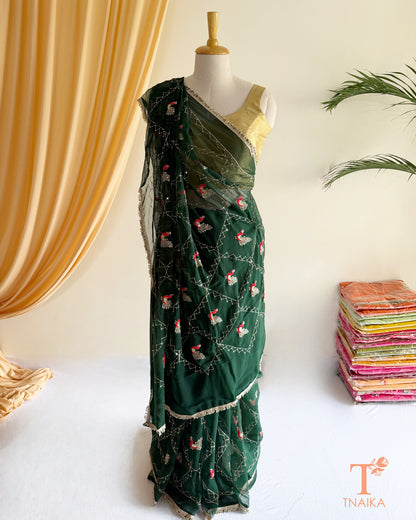 Festive georgette saree with heritage inspired embroidery and flowing drape