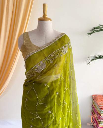 Rajputi style georgette saree with fine cut dana embroidery and elephant motif border