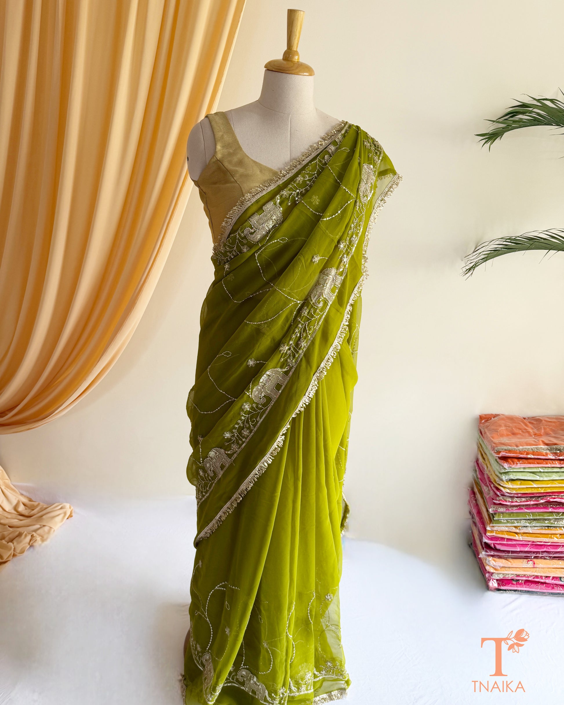Designer georgette saree with intricate cut dana embroidery and elegant border