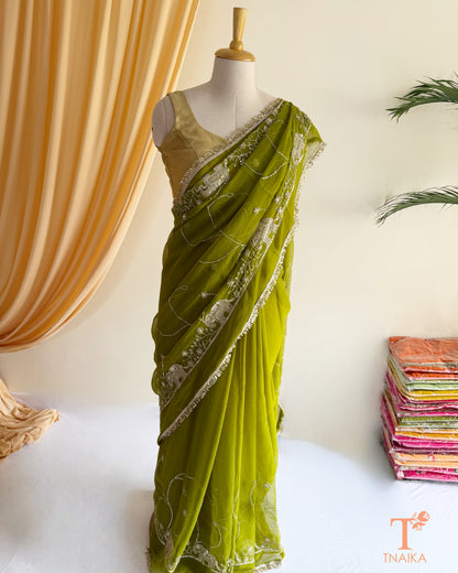 Designer georgette saree with intricate cut dana embroidery and elegant border