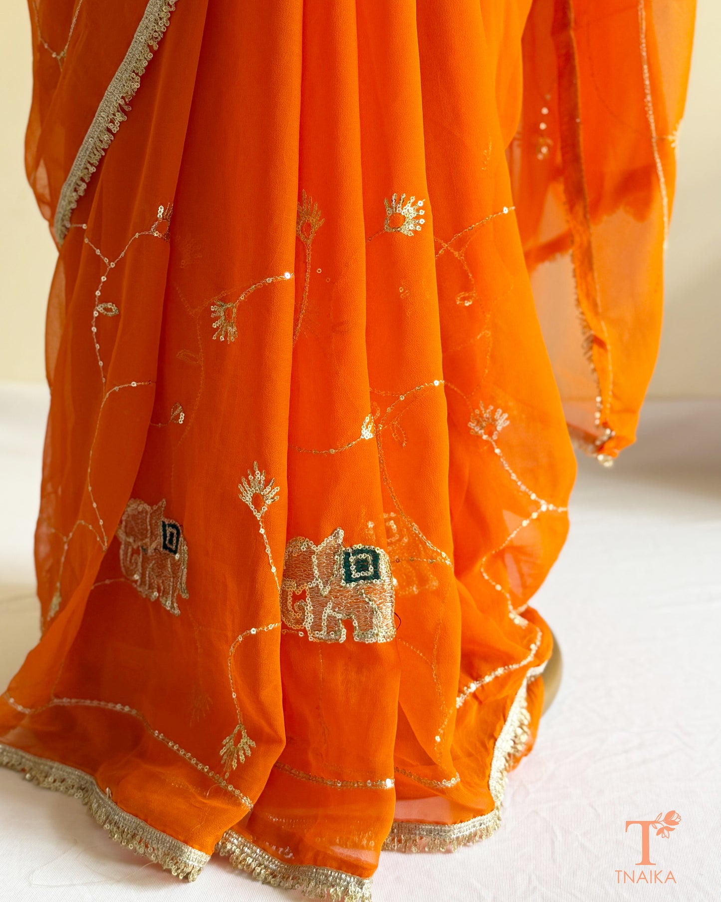 Rajputi style georgette saree with delicate cut dana and sequin embroidery