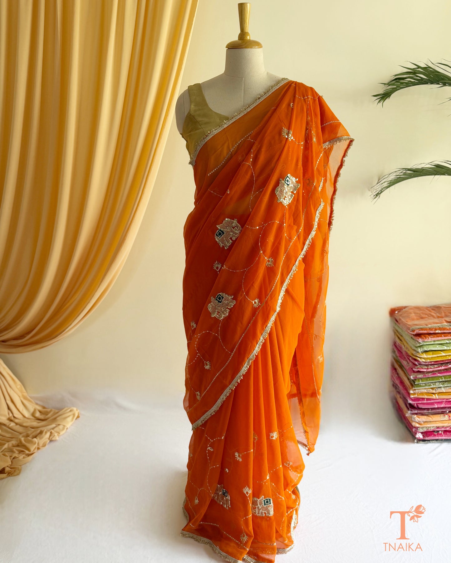 Lightweight embroidered georgette saree with lace border detailing