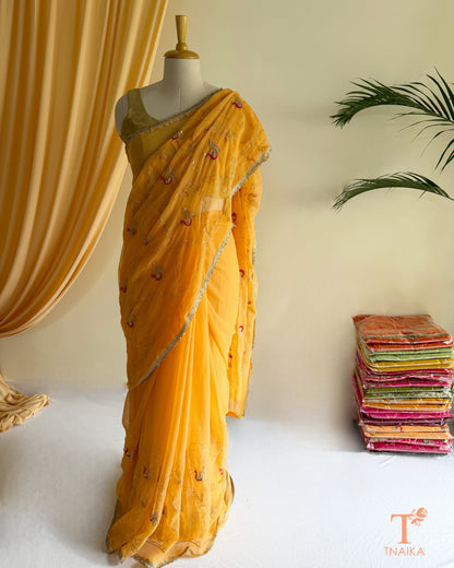 Designer georgette saree with intricate cut dana embroidery and elegant border