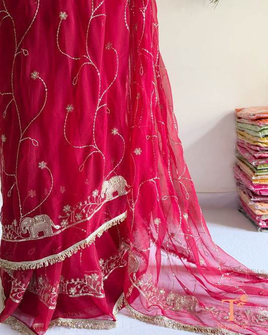 Soft georgette saree featuring elephant motifs and decorative lace border
