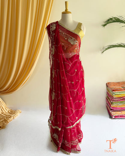 Festive georgette saree with heritage inspired embroidery and flowing drape