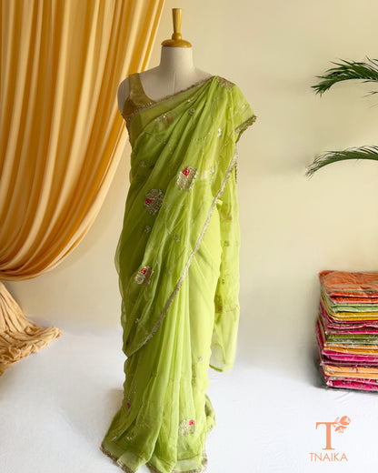 Elegant georgette saree featuring embroidered vine patterns
