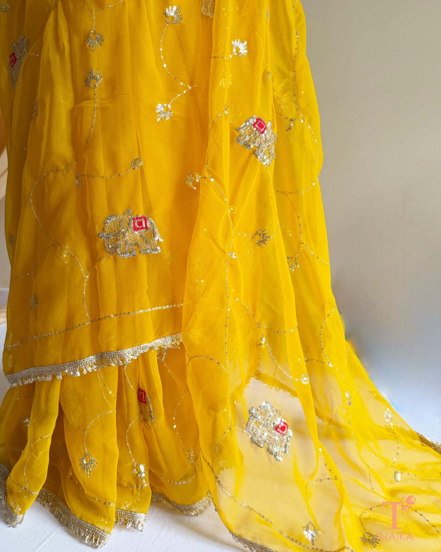 Rajputi style georgette saree with delicate cut dana and sequin embroidery