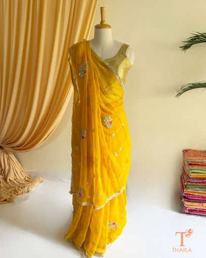 Lightweight embroidered georgette saree with lace border detailing