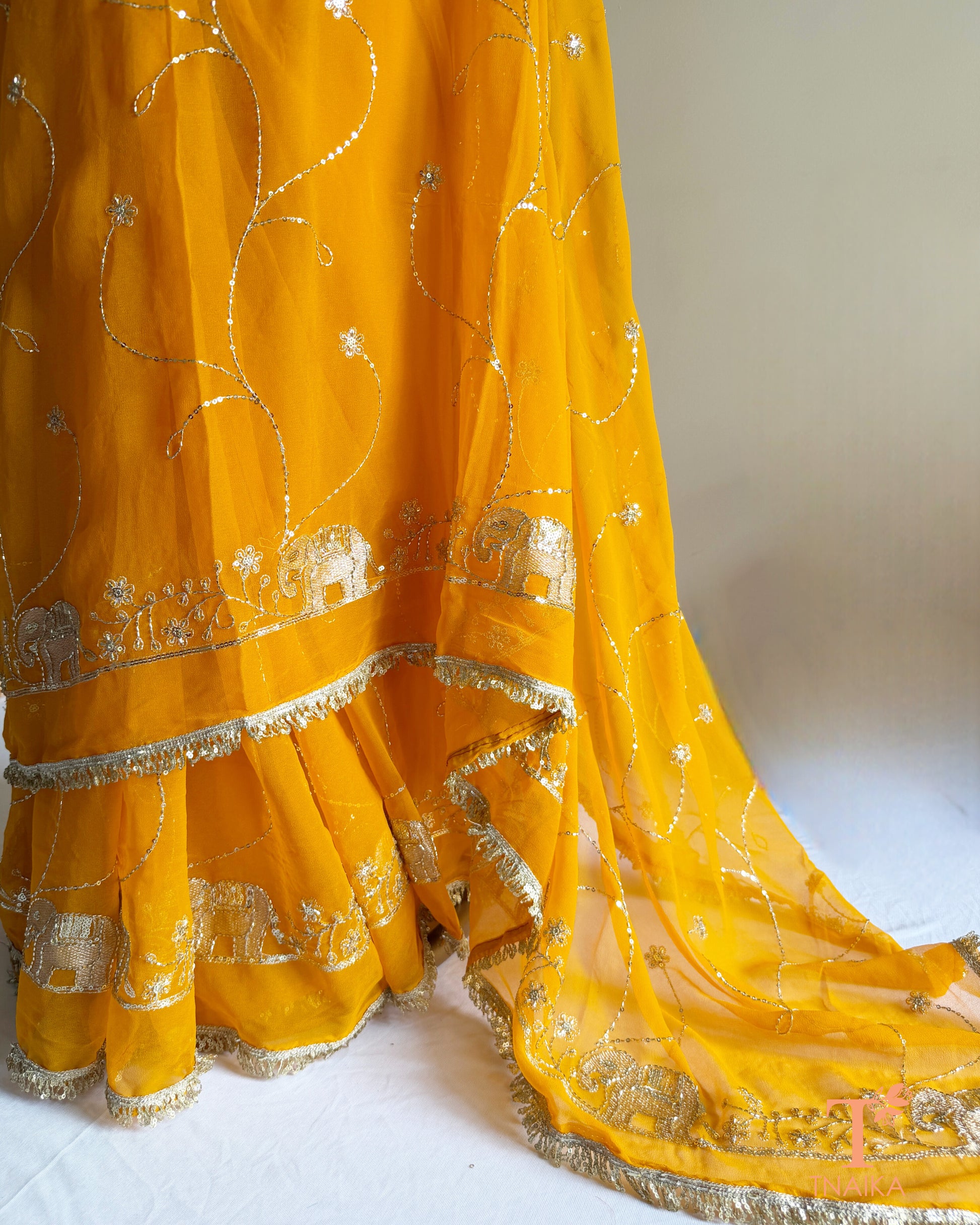 Designer georgette saree with intricate cut dana embroidery and elegant border