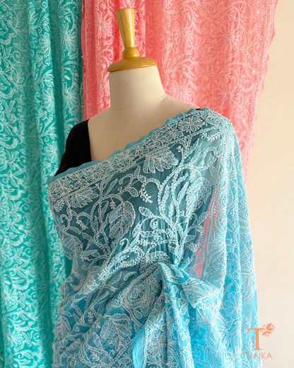 Chikankari saree featuring delicate embroidery on breathable lightweight fabric.