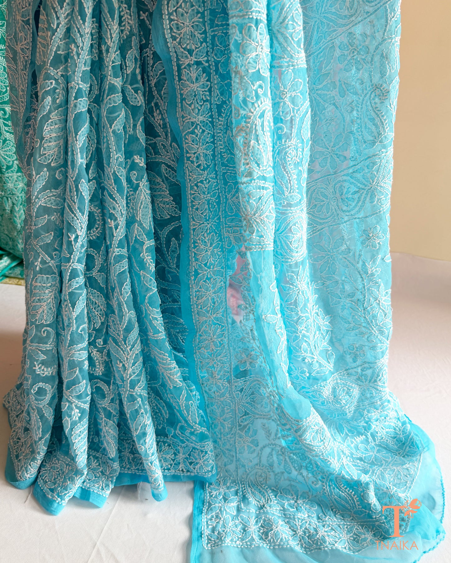 Feather-light Chikankari saree designed with fine embroidery for festive and everyday wear.