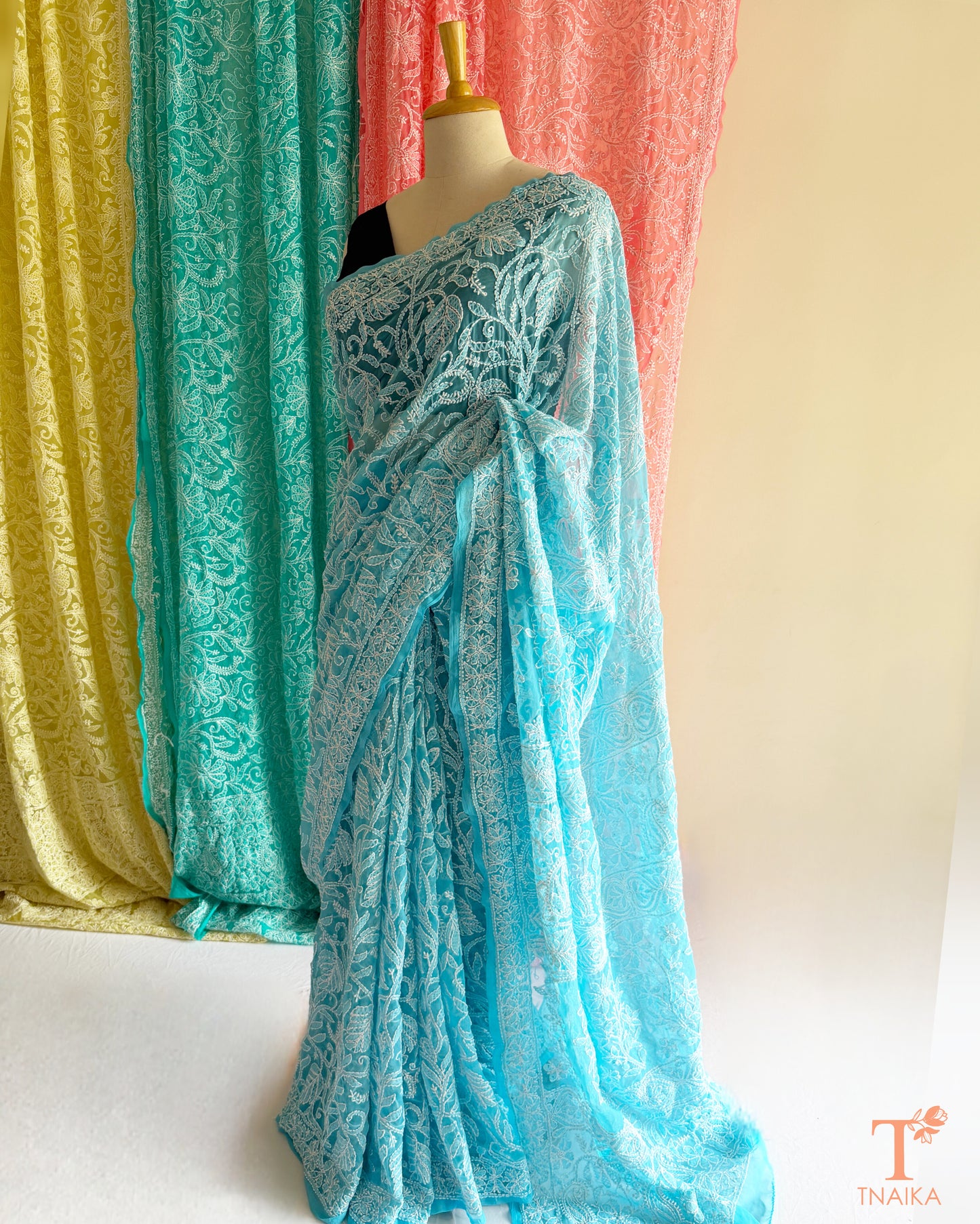 Premium Lucknowi Chikankari saree featuring delicate hand embroidery.