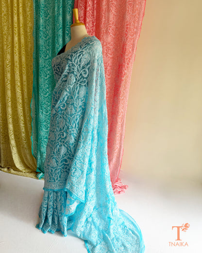 Authentic Chikankari embroidered saree with intricate craftsmanship and elegant appeal.