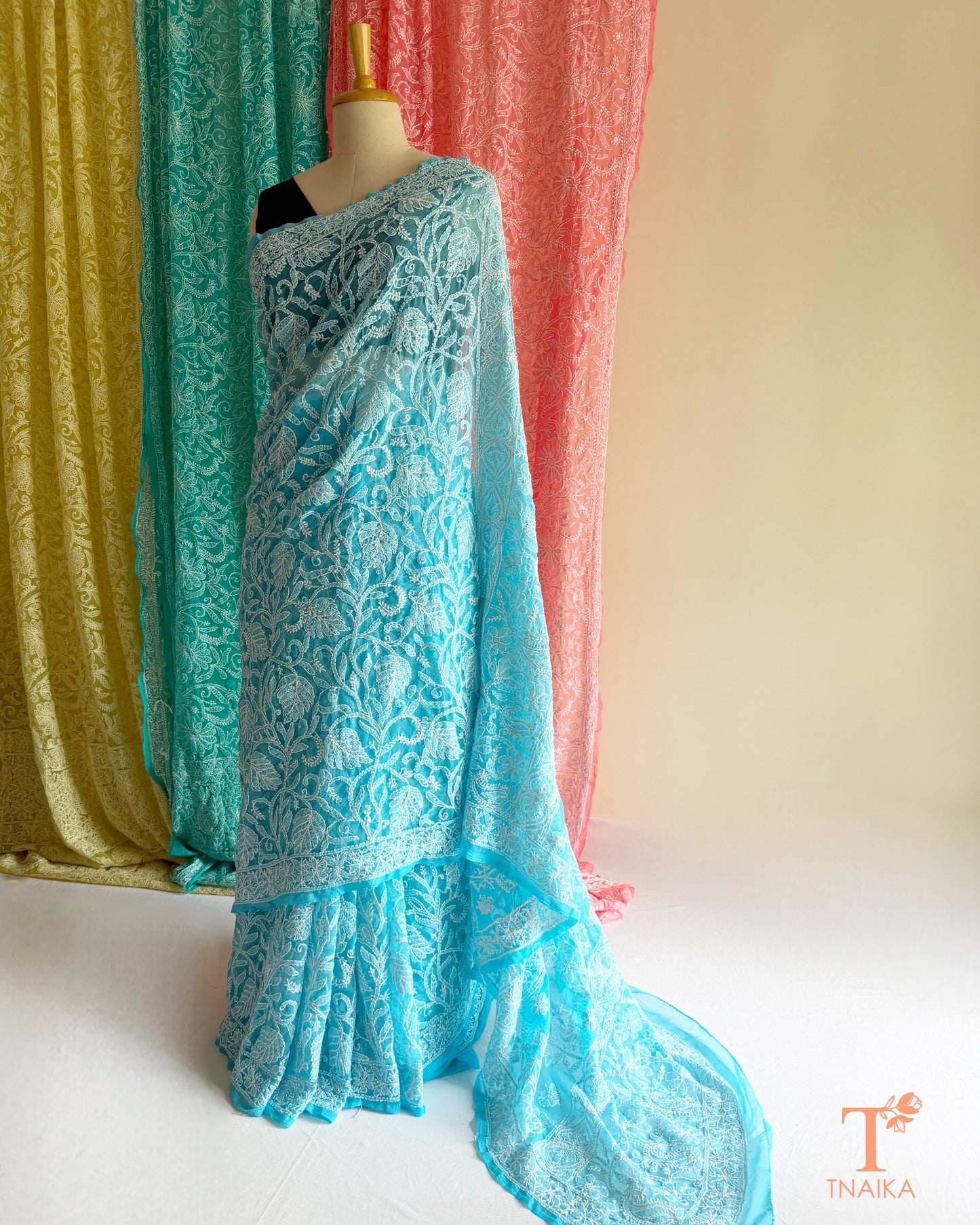 Handcrafted Chikankari saree with intricate Lucknowi embroidery and elegant drape.