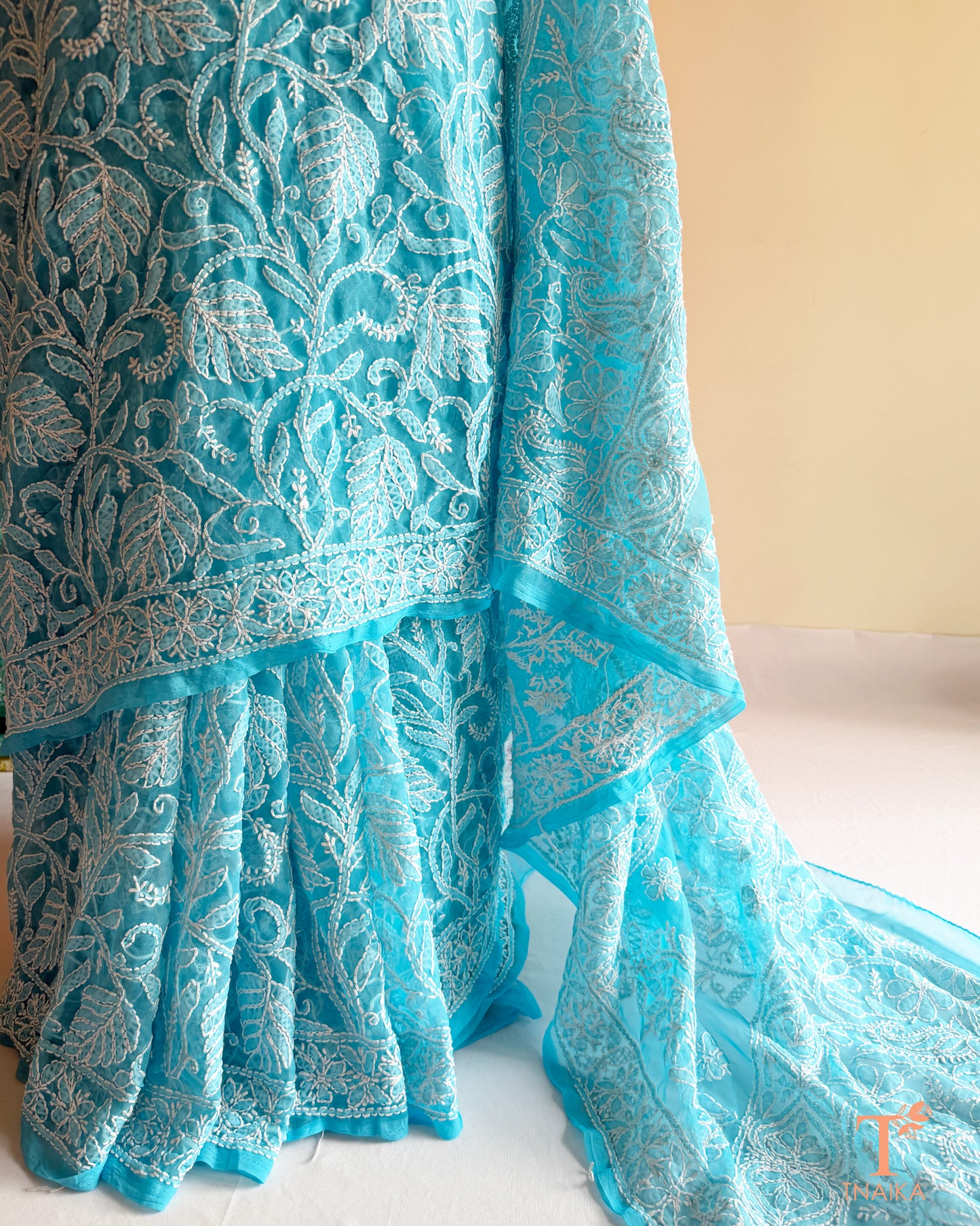 Elegant Chikankari embroidered saree crafted on soft, lightweight fabric.