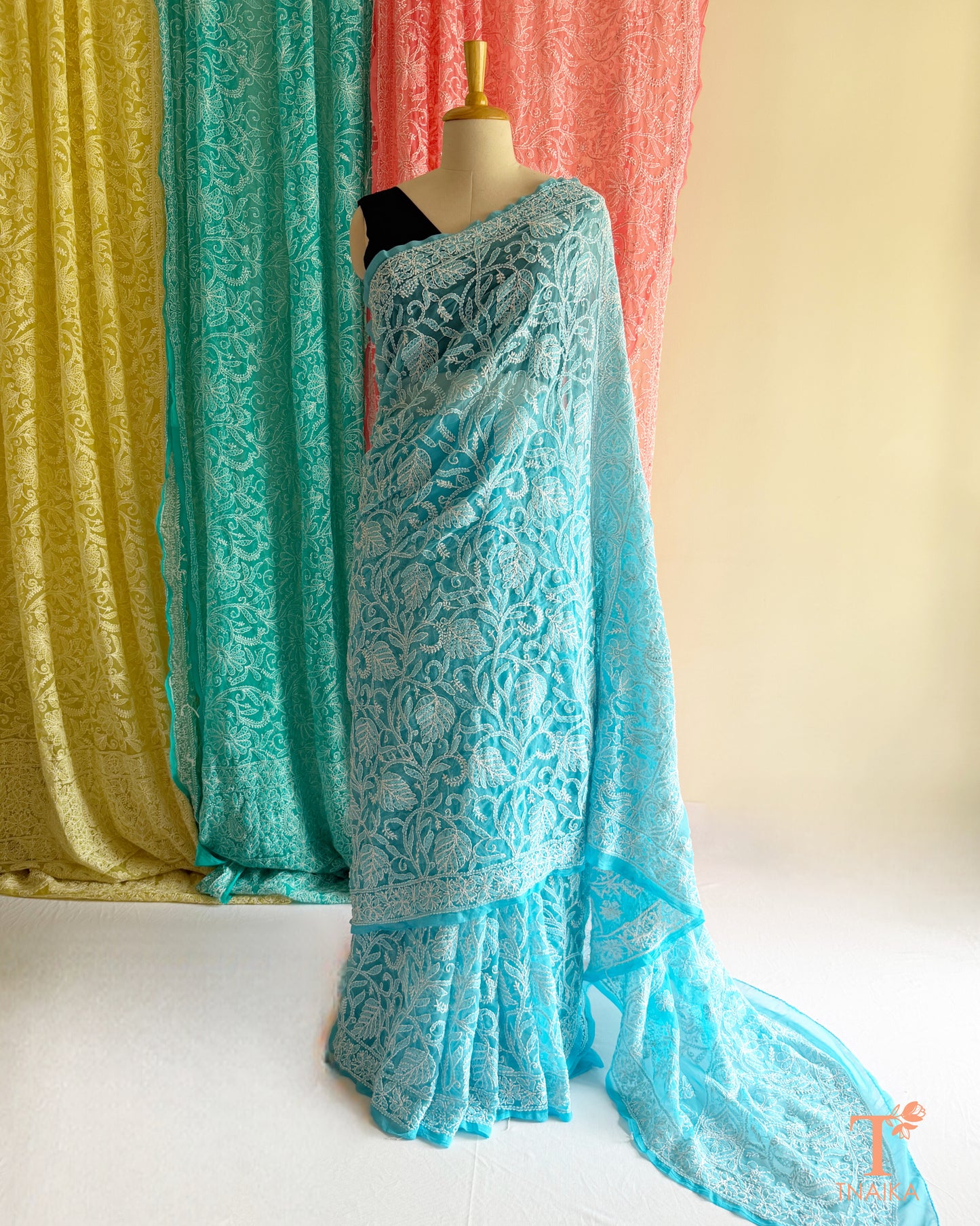 Traditional Chikankari saree with detailed floral embroidery and graceful finish.