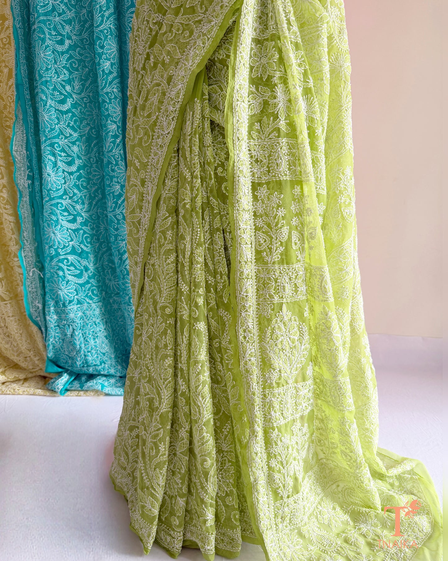 Handcrafted Chikankari saree with intricate Lucknowi embroidery and elegant drape.
