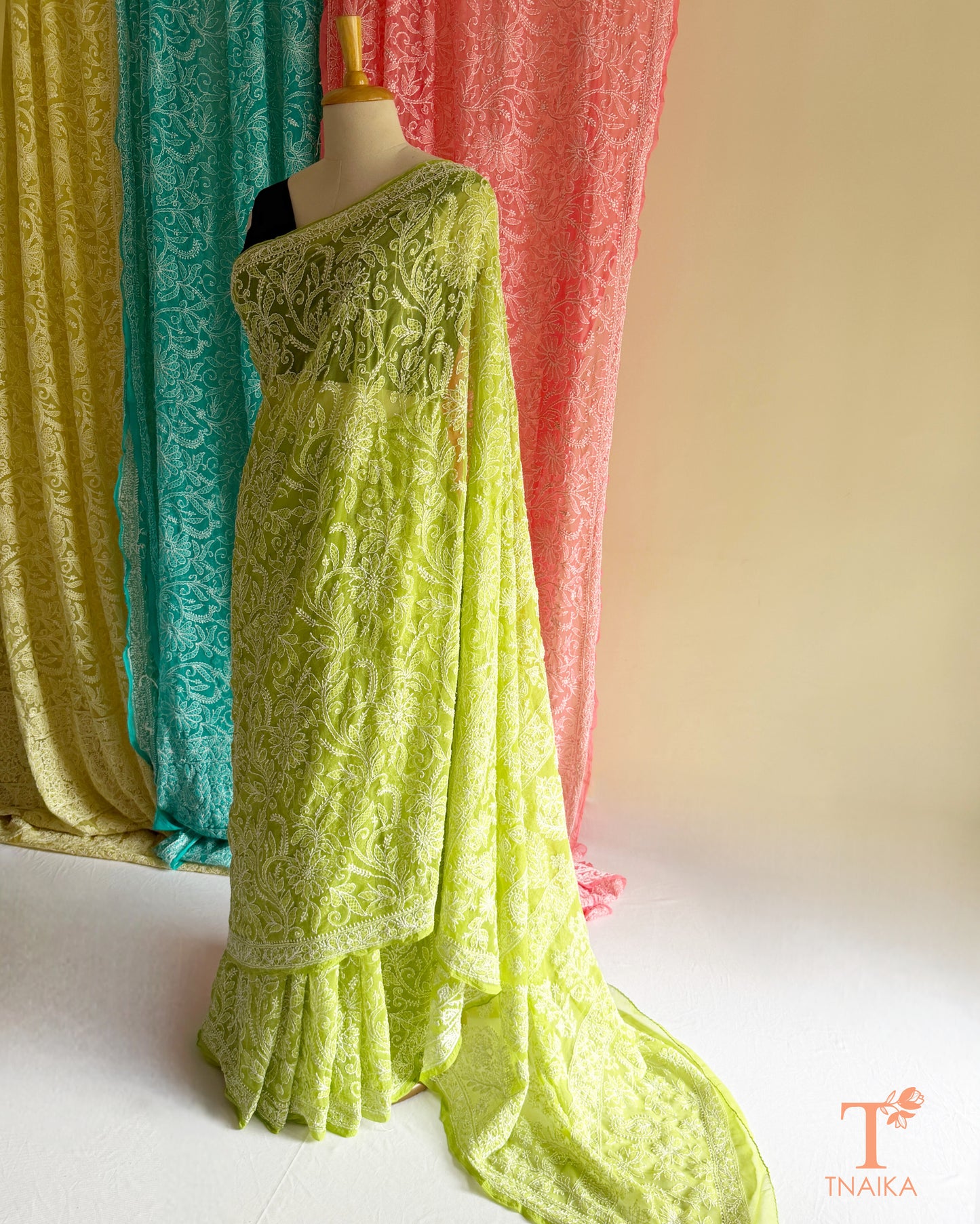 Premium Lucknowi Chikankari saree featuring delicate hand embroidery.