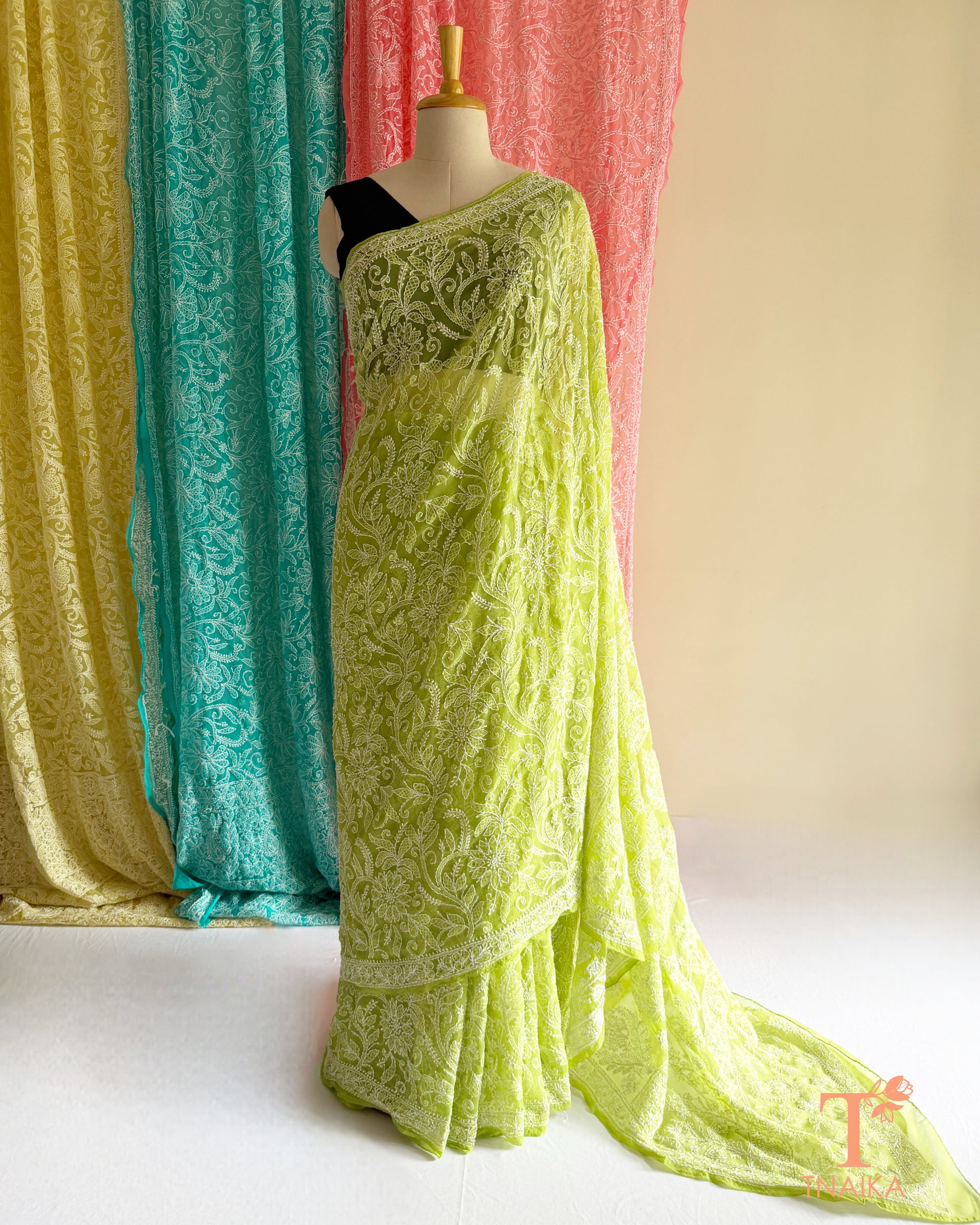 Elegant Lucknowi Chikankari saree perfect for festive occasions, celebrations, and gatherings.