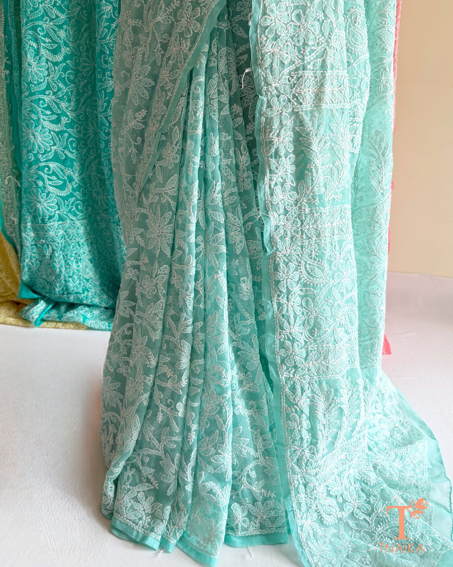 Feather-light Chikankari saree designed with fine embroidery for festive and everyday wear.