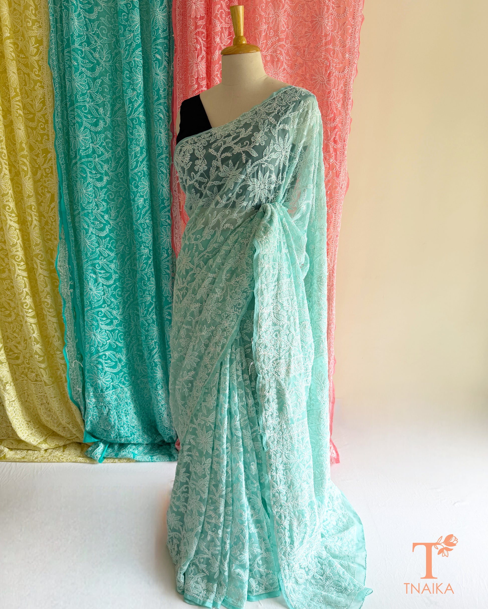Premium Lucknowi Chikankari saree featuring delicate hand embroidery.