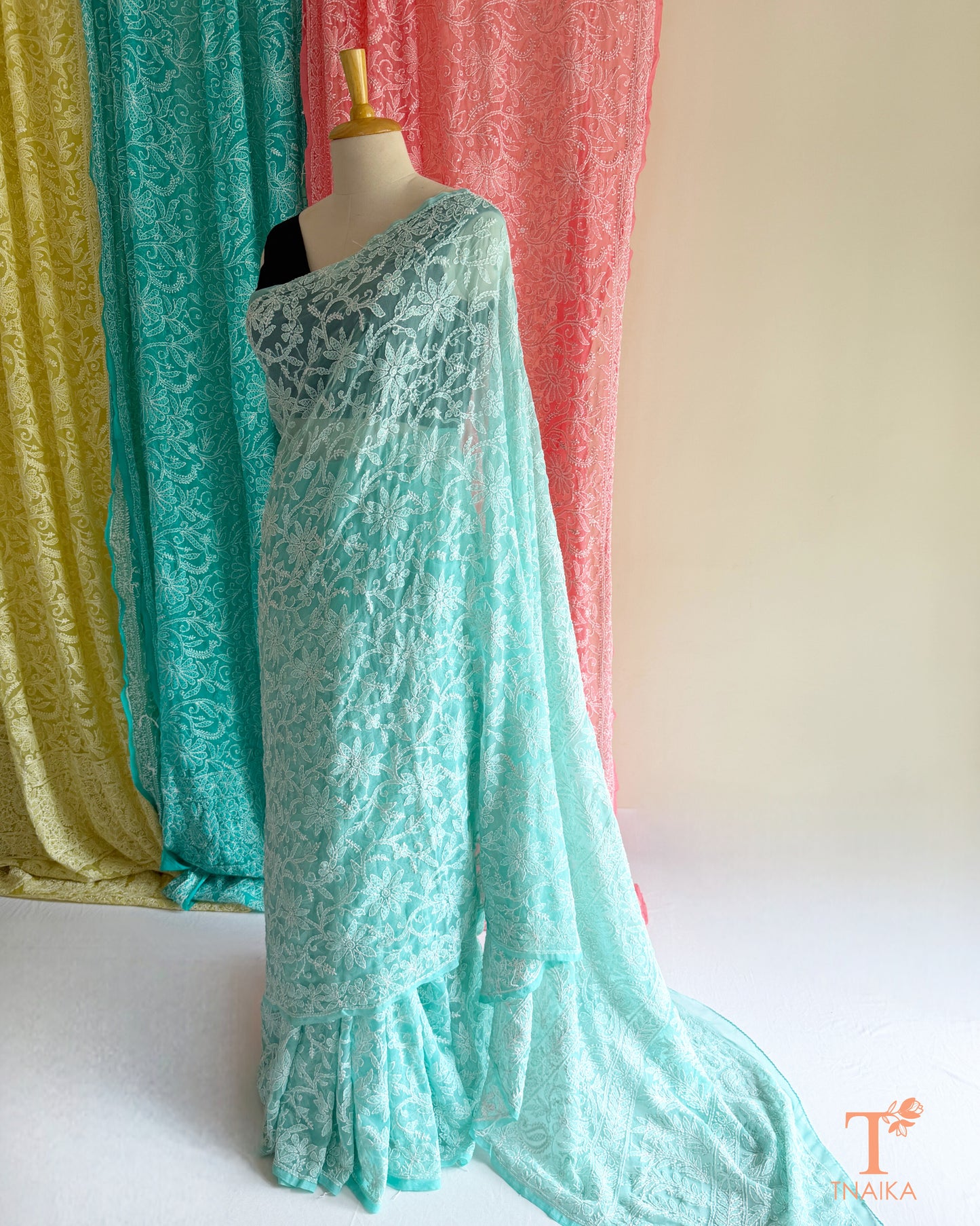 Traditional Chikankari saree with detailed floral embroidery and graceful finish.