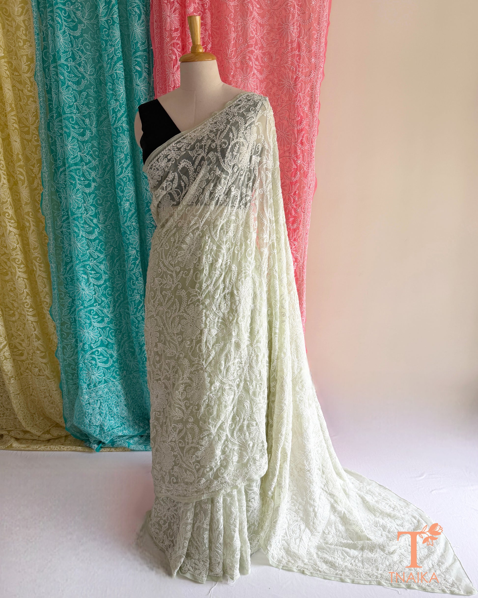 Authentic Chikankari embroidered saree with intricate craftsmanship and elegant appeal.
