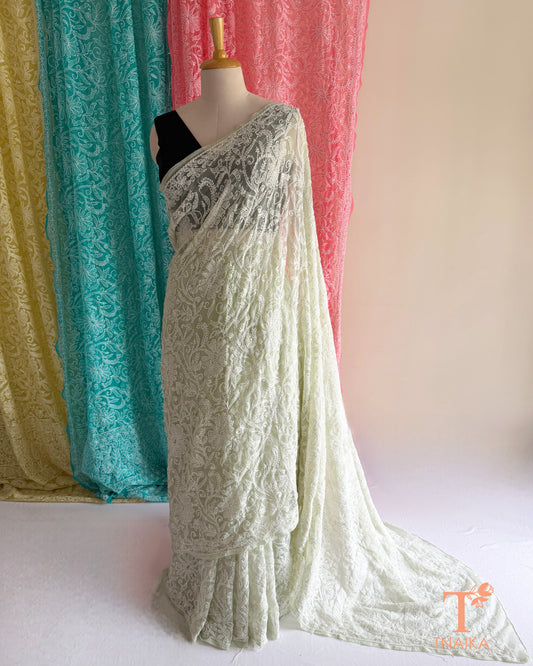 Authentic Chikankari embroidered saree with intricate craftsmanship and elegant appeal.