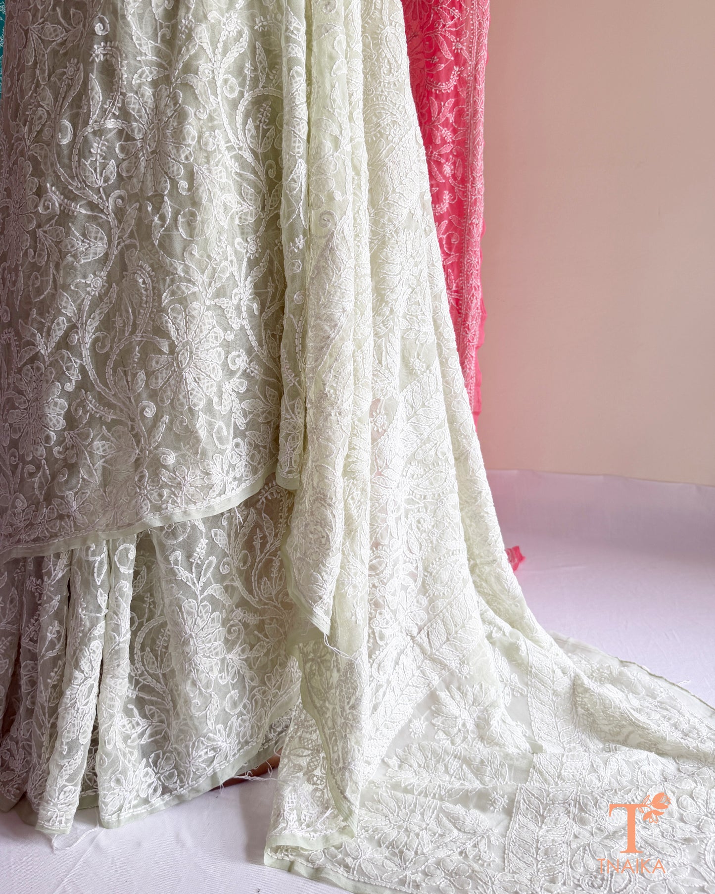 Handcrafted Chikankari saree with intricate Lucknowi embroidery and elegant drape.