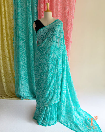 Authentic Chikankari embroidered saree with intricate craftsmanship and elegant appeal.