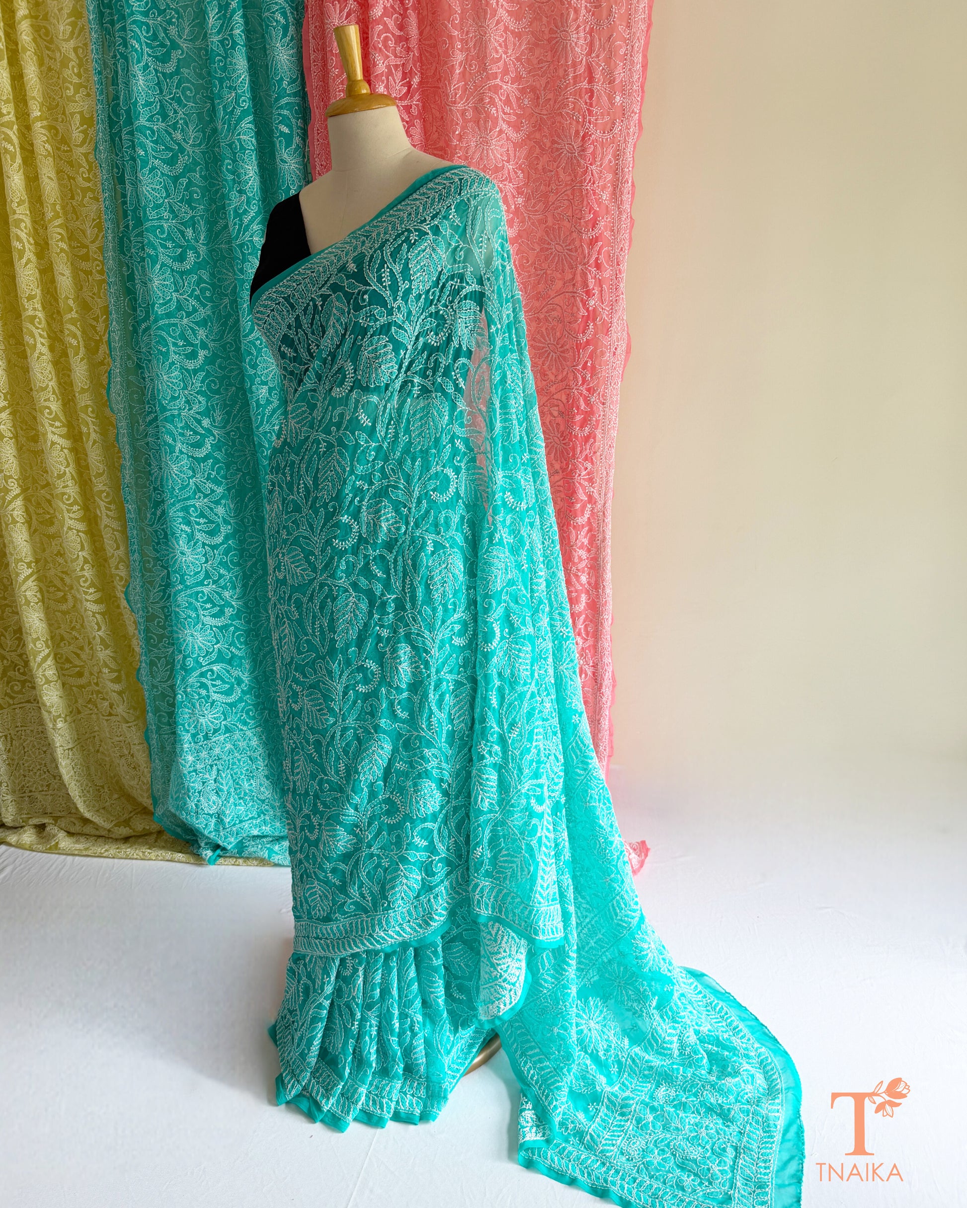 Elegant Chikankari embroidered saree crafted on soft, lightweight fabric.