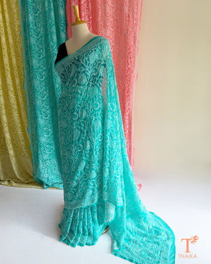 Elegant Chikankari embroidered saree crafted on soft, lightweight fabric.